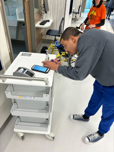 Darrel Jackson makes history, performing the first phlebotomy collection in the new Pavilion Hospital.